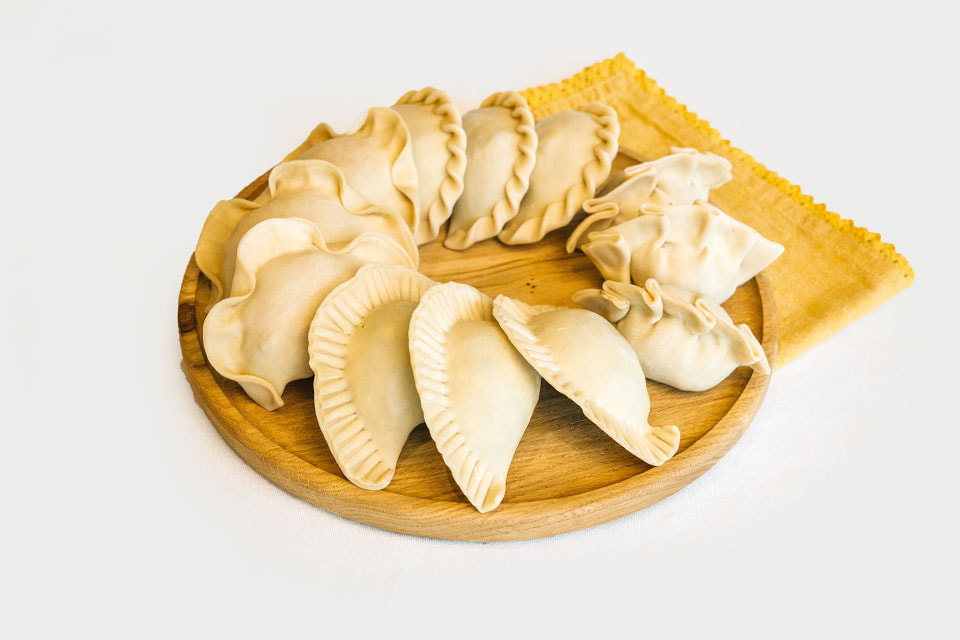 Package of 12 Fresh Made Raw Empanadas