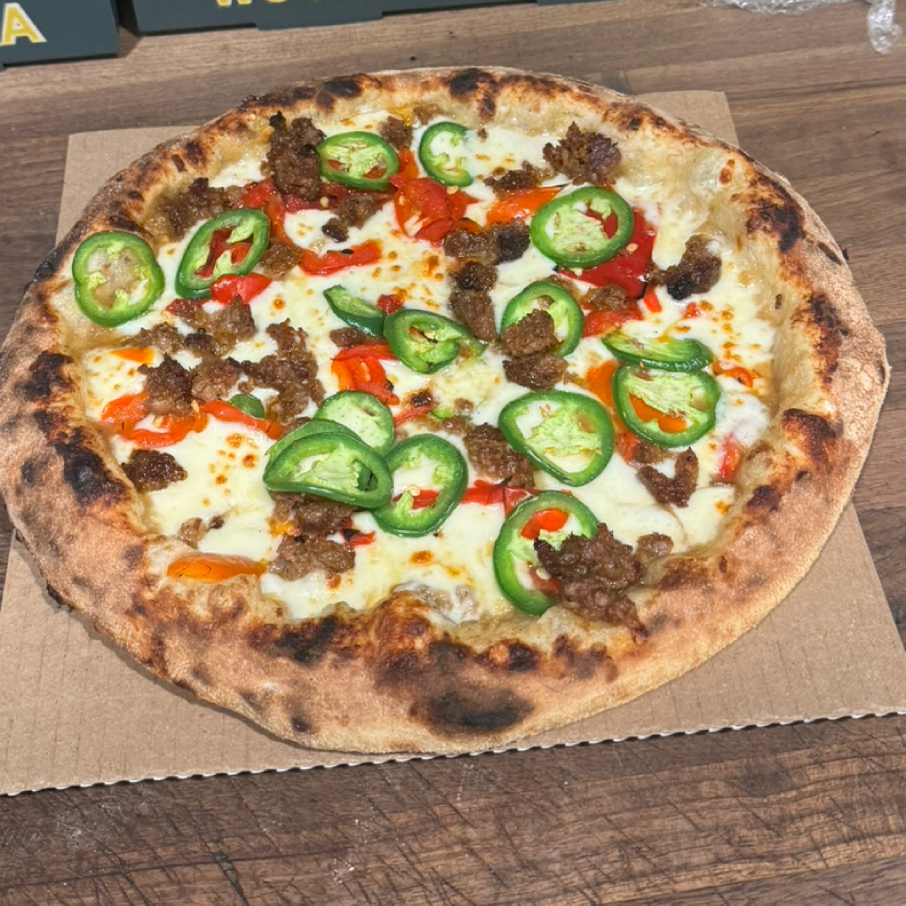Spicy Sausage and Peppers Pizza